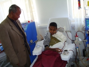 Assefa visited by his uncle Abba Abraha Baraki at the hospital